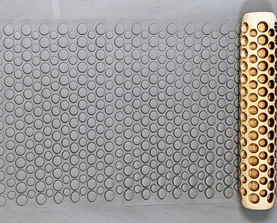 marks in clay made by this roller