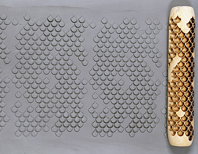marks in clay made by this roller