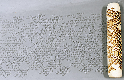 marks in clay made by this roller