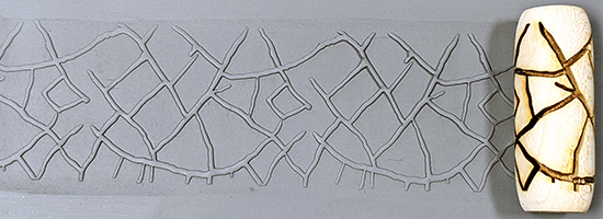 marks in clay made by this roller