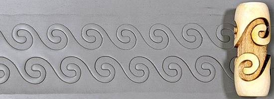 marks in clay made by this roller