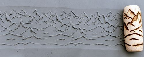 marks in clay made by this roller