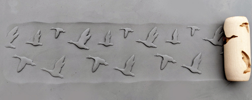 marks in clay made by this roller