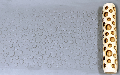marks in clay made by this roller