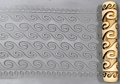 marks in clay made by this roller