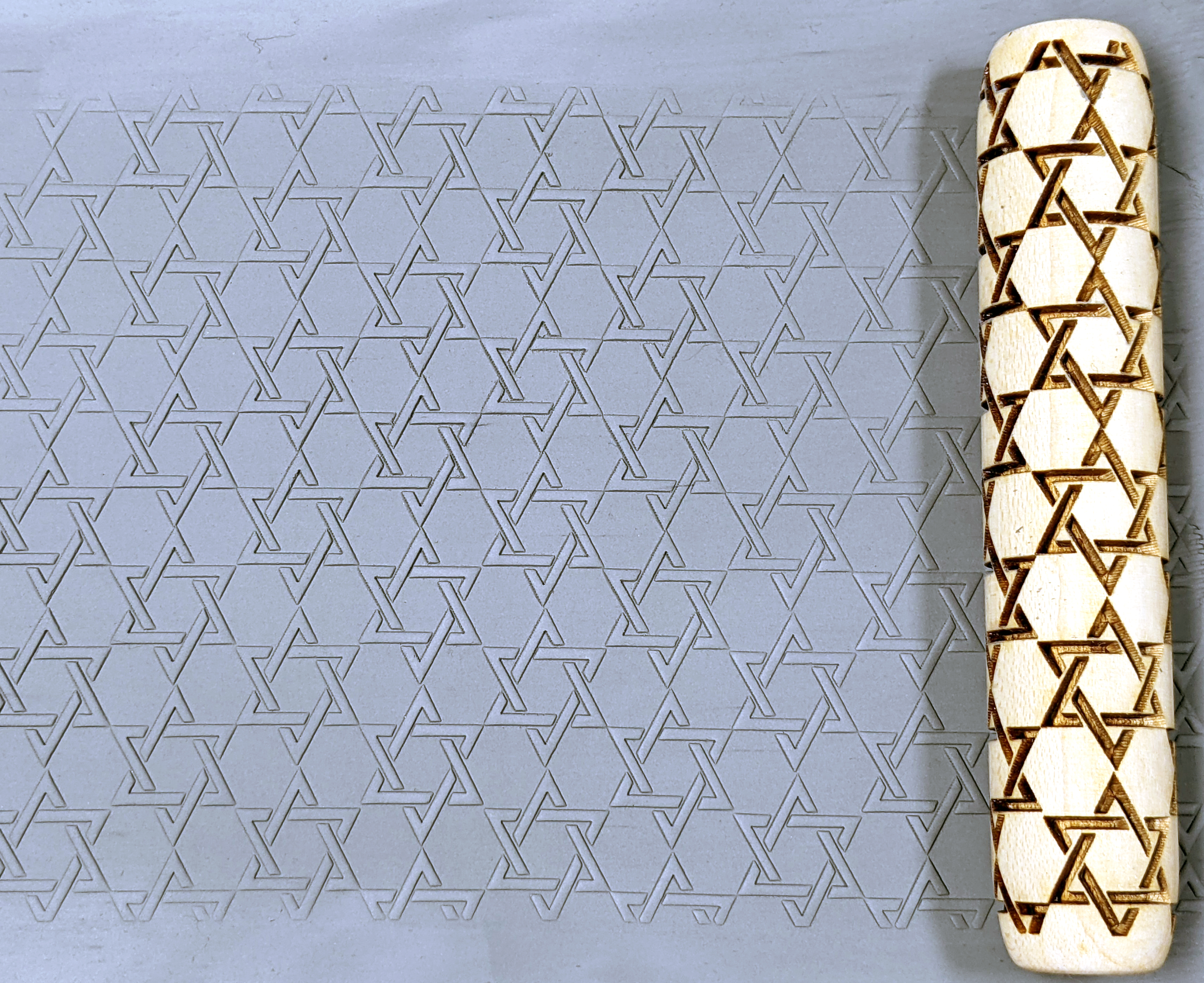 marks in clay made by this roller