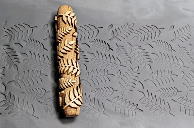 marks in clay made by this roller