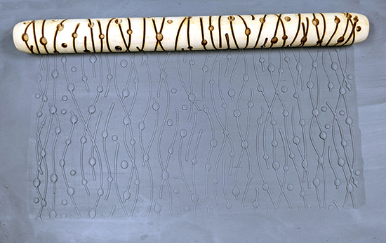 marks in clay made by this roller