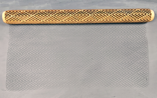 marks in clay made by this roller